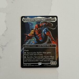 Magic the Gathering Battle Damage Spiderman card from Marvel Legends Spiderman